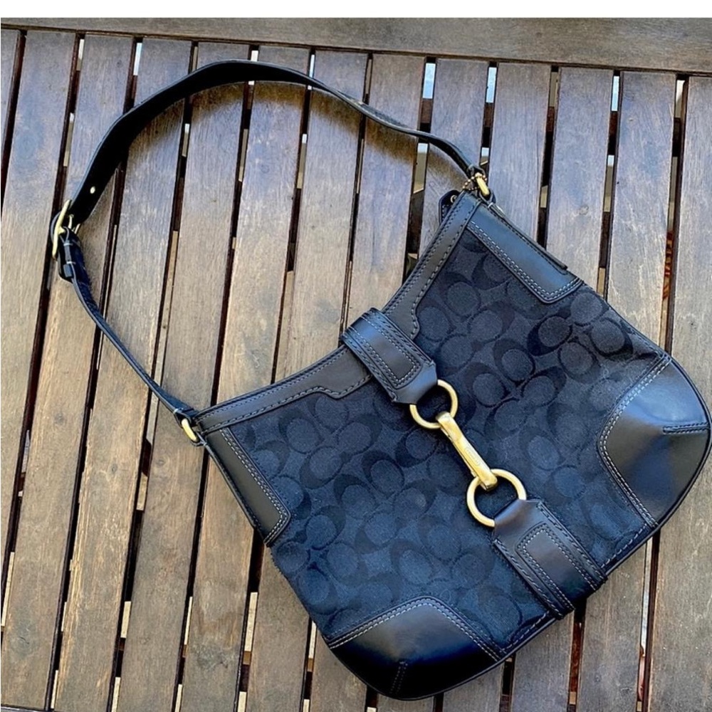 Coach Black Shoulder Bag with Adjustable Strap and Gold Hardware